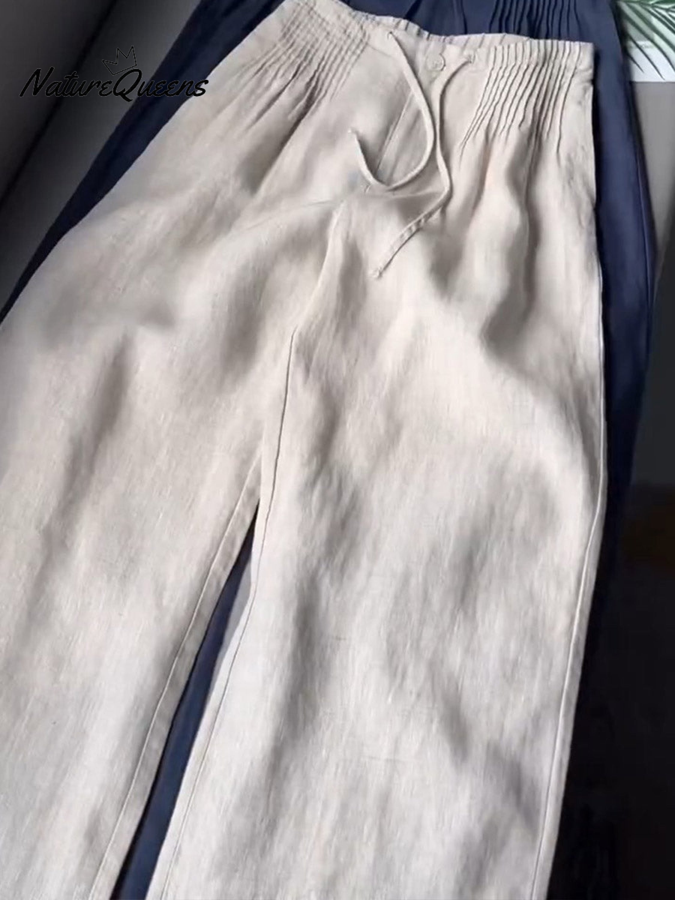 🔥Limited time promotion Women's Solid Color Pleated Drawstring Casual Cotton and Linen Wide Leg Pants